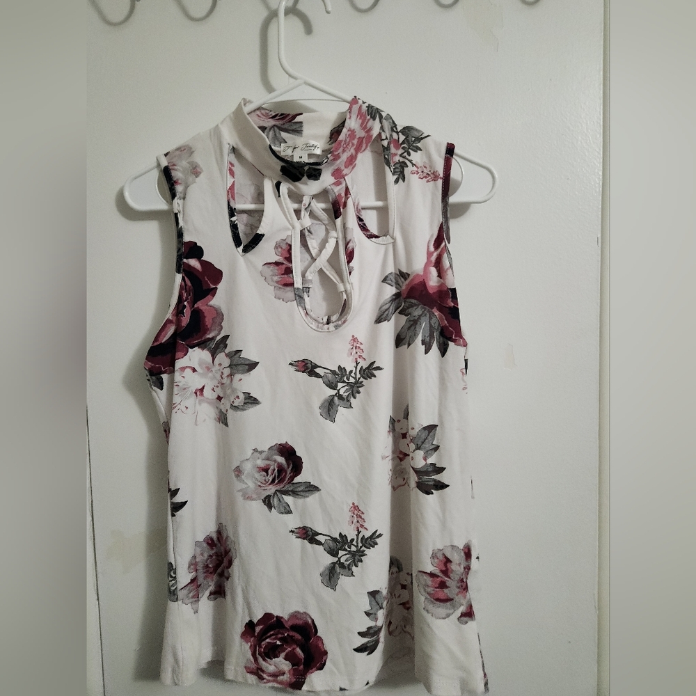 Floral Sleeveless Blouse with Crisscross Neckline